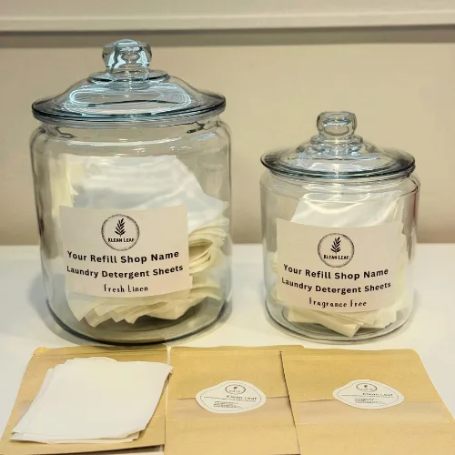 Refill station jars for bulk laundry detergent sheets