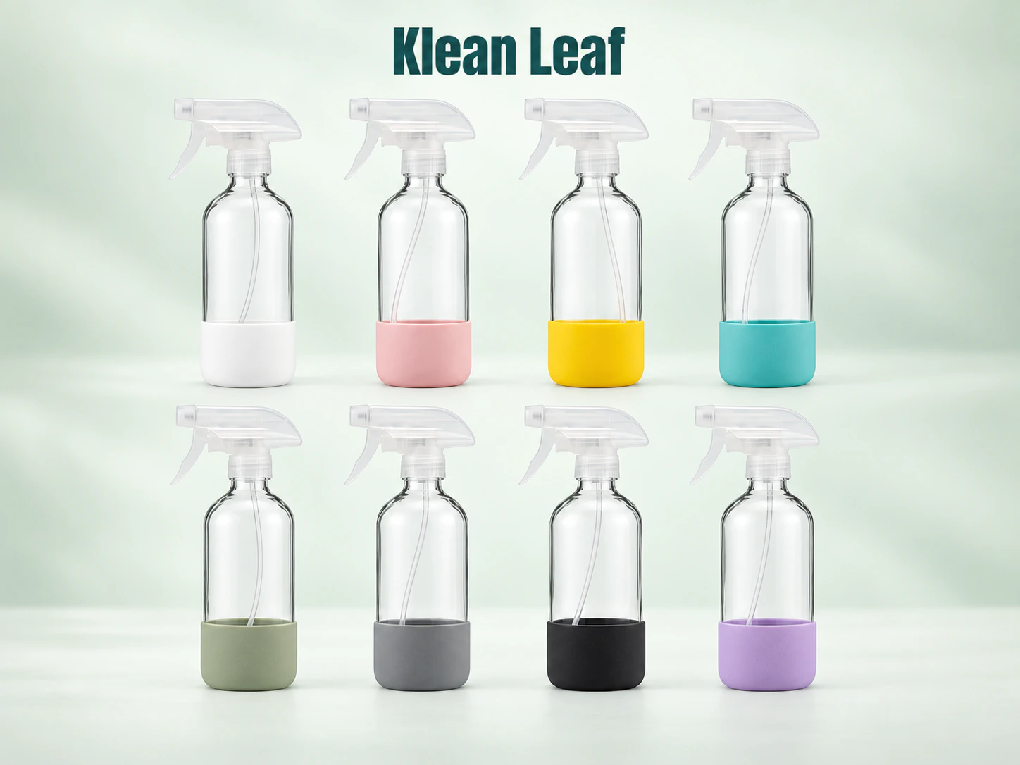 Eight Klean Leaf glass spray bottles with white triggers and colorful protective sleeves