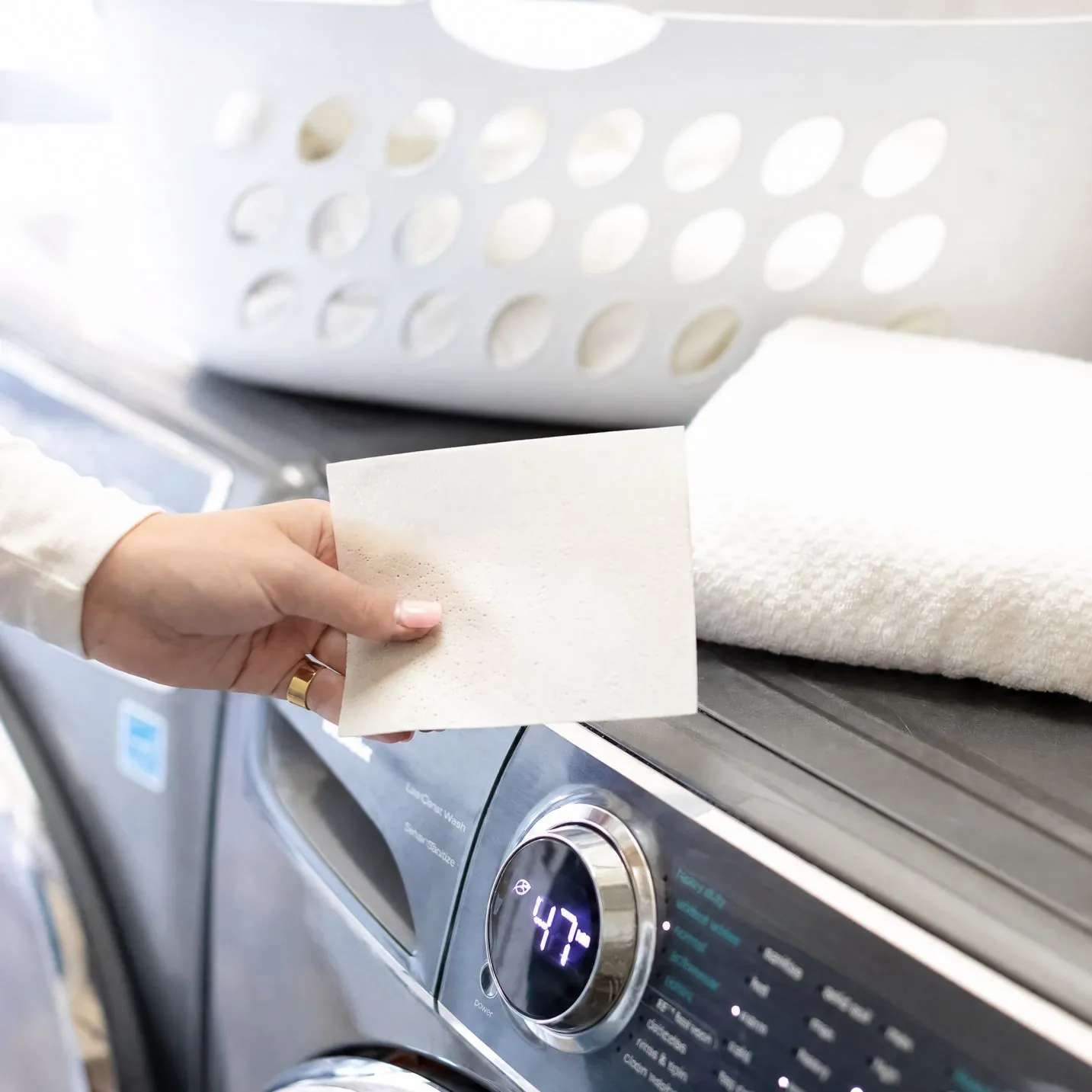 Laundry detergent sheet used at home before washing clothes